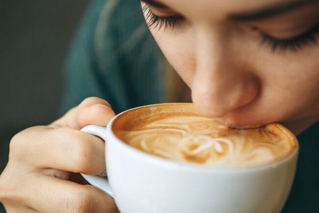 Woman drinking coffee