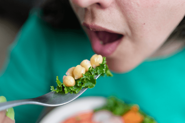 Woman eating pulses