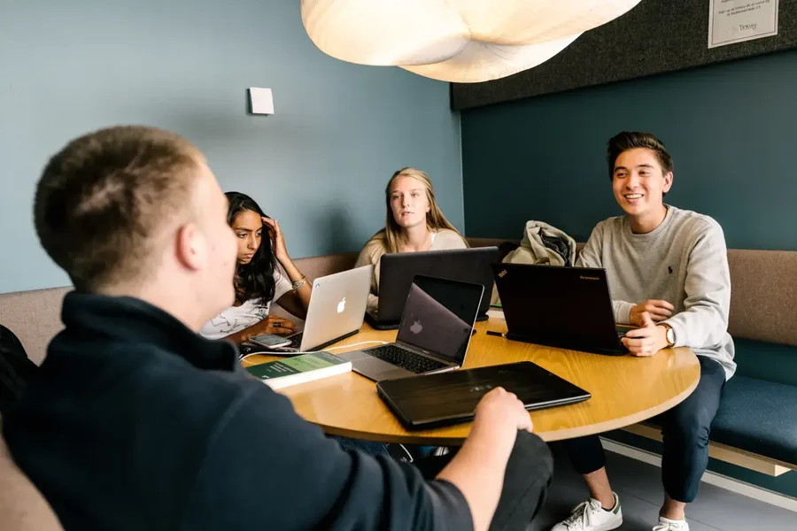 Group of students working.