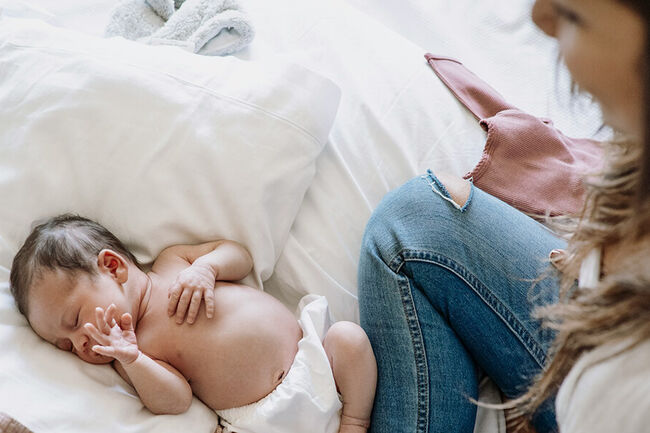 Mother looking at infant