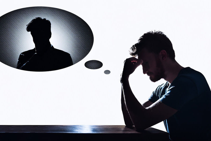 Man sitting down thinking