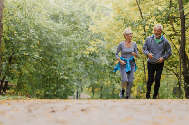 Senior couple jogging in the park